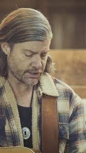 Grab your shoulder. Look at the ground. Boom. The Pensive Beach Cowboy.