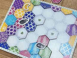 In calico, players compete to sew the coziest bedspread while collecting and placing patches of different colors and patterns. Calico Board Game Review Nerdly