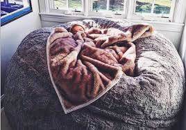This Lovesac Pillow Chair Is As Big As A Bed And You Ll Wait One Immediately Hellogiggles Lovesac Pillow Bean Bag Bed Lovesac
