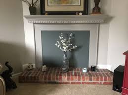 Smoke Gray Fireplace Fashion Cover Adorned With A Beautiful Vase Of Flowers Fireplace Cover Fireplace Draft Stopper Fireplace