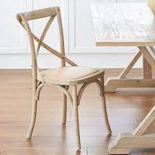 The cross back chair creates a charming and inviting ambiance with its curved lines and smooth finish. Oak Cross Back Dining Chair Cross Back Dining Chairs Dining Chairs Elegant Dining Room Furniture