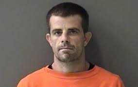 Man indicted after accused of threatening witness with chain saw