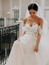 The bodice is lightly fitted, and the back dips to a mid v and zips up with ease under sparkling crystal buttons. Faery A Line Lace Wedding Dresses Off The Shoulder Summer Beach Bridal Gowns Sweep Train Australia Designer Long Wedding Gowns Vintage Joepaldress Online Store Powered By Storenvy
