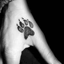47 Tiny Paw Print Tattoos For Cat And Dog Lovers Small Hand Tattoos Hand Tattoos For Guys Small Tattoos For Guys