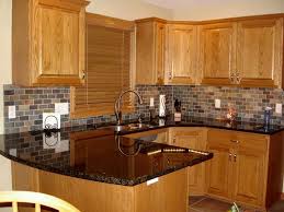 Granite Kitchen Countertops With Honey Oak Cabinets Google Search Affordable Kitchen Cabinets Oak Kitchen Black Kitchen Countertops