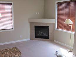 Awesome Stone Corner Fireplace With Grey Wall Painted Color Schemes Also Blinds For Bedroom Windows Trea Corner Gas Fireplace Fireplace Design Corner Fireplace