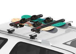 I've been doing it this way for years after trying many different paths for the straps, attachment points, and orientation of the ratchet itself. How To Tie Down Skis And Snowboards To A Roof Rack Etrailer Com