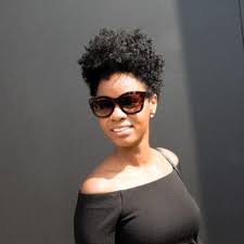 This pixie with the thick angled fringe helps to open up her round face. Curly Haircuts For Round Faces All Things Hair Us