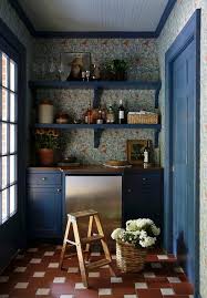 blue farmhouse pantry with vintage red