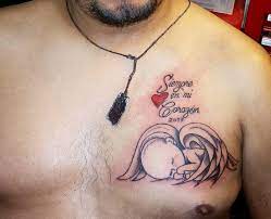 Although what really represents the loss is the black and red design, the flowers really add something extra to it with such a pop of color. 110 Best Memorial Tattoos Designs 2021 Rip Grandparents Friends Parents