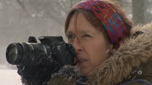 Camera In Hand, Artist's Model Captures Urban Wildlife