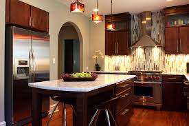 The wall of cabinetry hides the refrigerator for a seamless look and provides ample storage eliminating the need for upper. Modern Evanston Kitchen Contemporary Kitchen Chicago By Normandy Remodeling Houzz
