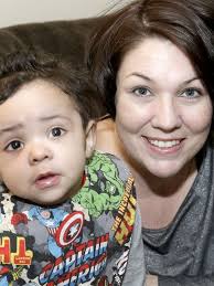 Canton mother survives heart attack while delivering son