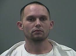 Inmate accused of stomping