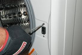 In some cases, the door assembly clicks at an attempt to close remove the top panel: How To Replace The Door Lock Assembly On A Front Load Washer Repair Guide