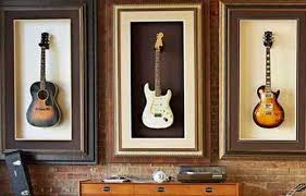 I did a rough layout on the wood, making the holder 17 cm heigh x 12 cm wide and 13 cm from the arms to the wall. Ultimate Diy Guide To Hanging A Guitar On The Wall Guitar Gear Finder