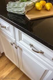 When dry, sand lightly to smooth out the patch. Kitchen Cabinet Refacing Our Before Afters Driven By Decor