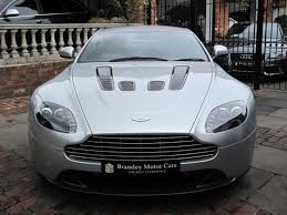 Image result for Titanium Silver 2010 Aston Martin