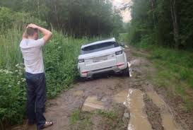 A driver was given a helping hand after a car got stuck in the mud at the national eisteddfod near llanrwst. Car Stuck In The Mud Justpost Virtually Entertaining