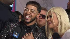 'we still love each other'. Karol G And Anuel Aa Share Details About Their Romantic Proposal And Engagement Exclusive Entertainment Tonight