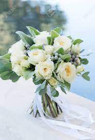 Essential white wedding flowers guide. White Roses With Greenery Promotions