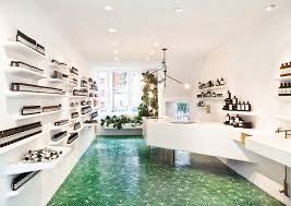 The Curved Plasterwork Of Typical Mediterranean Architecture Influenced The Smooth White Interior Of This Store For Skin Aesop Store Retail Design Store Design