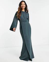 White floral print embellishes breezy woven rayon as it drapes into a sultry surplice bodice, framed by fluttering short sleeves. Asos Design Front Twist Maxi Dress With Fluted Sleeve In Forest Green Asos