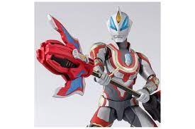 The synthetic son of the evil reionics ultra warrior, ultraman belial, geed was born at an unknown point after the crisis impact, and has spent most of his life on earth unaware of his origins. S H Figuarts Ultraman Geed The Movie Ultraman Geed Ultimate Final Bandai Limited Mykombini