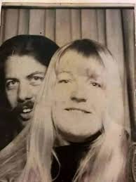 My mommy and daddy having fun in a photo booth