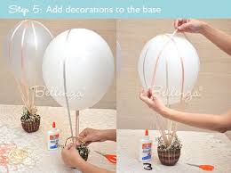 We decided to highlight ours with a dessert table underneath complete with sweet treats and beautiful florals although, you don't. How To Make A Hot Air Balloon Centerpiece For A Wedding Diy Hot Air Balloons Hot Air Balloon Baby Shower Hot Air Balloon Decorations
