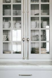 Product photography and illustrations have been reproduced as accurately as print and web technologies permit. Light Gray Seeded Glass China Cabinets Transitional Kitchen