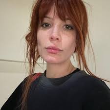 always gotta be one hair that sticks to ur gloss, but we keep it movin. my  world is small these days. (it's Ender)