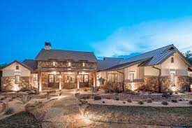 This stunning 3 bedroom ranch home inspired texas hill country cabin rental is a remarkable vacation getaway. Texas Farmhouse 1 Story Geschke Texas Hill Country House Plans Texas Farmhouse Texas Style Homes