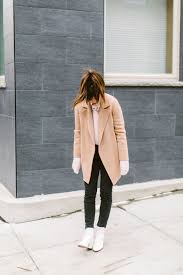 Woman Black Jeans And Brown Boots Wearing White Ankle Boots With Black Jeans And This Surprising Color The Mom Edit Black Women Fashion Fashion Womens Fashion Classy Casual