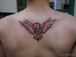 The head is placed in the center of the sternum while the wings stretch from one breast to the other. Small Eagle Tattoo On Chest