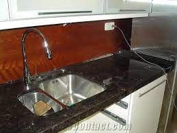 Do you see how unusual and gorgeous this antique brown granite kitchen counter is with the itty bitty travertine tiles and the copper sink? Antique Brown Granite Countertop From Poland 70831 Stonecontact Com