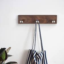 The hanger is ideal for hanging one item or several. Gooddoghousehold Key Hooks 9 Inch Adhesive Key Hanger Rail With 3 Hooks Wall Mounted Coat Rack Stainless Steel Coat Hooks Black Walnut Wayfair