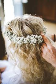 Place a large flower crown atop your short hair for a bold and playful vibe. Fairytale Wedding Hairstyles With Flowers Wedding Estates