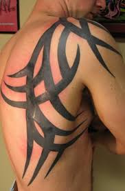 A tribal tattoo is simple, often with a single color (black) and a though the history and real meaning of tribal tattoos are regrettably lost in most people today, they remain popular among men looking for a manly design. 60 Tribal Tattoos For Men