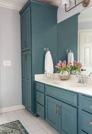 These crisp blend of colors help create a dynamic bathroom with a soft, rejuvenating side. Bathroom Vanity Cabinet Color Trends For 2020 Hunker Bathroom Cabinet Colors Bathroom Cabinet Makeover Beautiful Bathroom Vanity