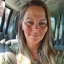 Is the centerpiece too busy with the school logo and face?