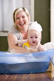 Here are basic steps for giving your baby a bath: Happy Mother Bathing Her Cute 7 Month Old Baby Stock Photo Picture And Royalty Free Image Image 6610620