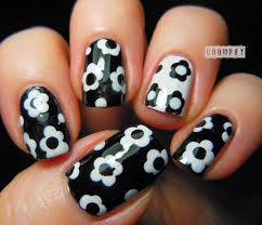 Alternate white and black tips with stars to stay on cloud nine. 50 Most Beautiful Black And White Nail Art Designs