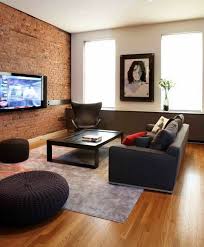 This is because of the function of the white color is making the room looks cleaner and wider. Exposed Brick Wall In Living Rooms Homes With Fantastic Atmosphere