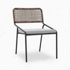 Several intimate friends start a cozy time with a stylish metal dining table set and iced wine. Metal Garden