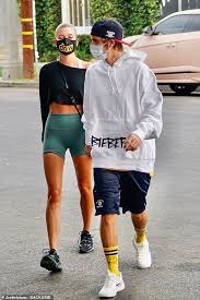 Justin Bieber Tenderly Holds His Crop Top Clad Wife Hailey Hailey Celebrity Look Justin Bieber