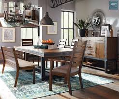 Scott Living Saturday A Harmonious Mix Between Industrial And Utilitarian Design Dining Table With Bench Black Dining Room Furniture Dining Furniture Sets