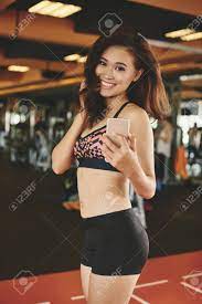 Fit Asian Girl Posing For Selfie In Sports Club Stock Photo, Picture and  Royalty Free Image. Image 77182723.