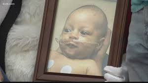 'It means everything'; Couple whose infant son passed away gets picture  with Santa