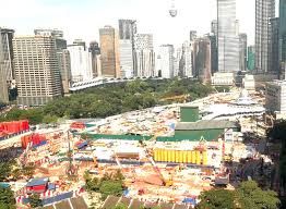 The postal service is an essential government service. Hive Of Activity Around Klcc Park